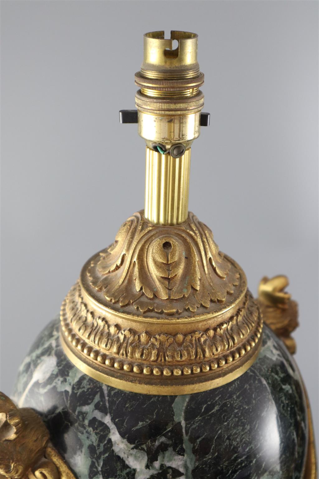 A pair of early 20th century ormolu green marble table lamps, overall height 20in.